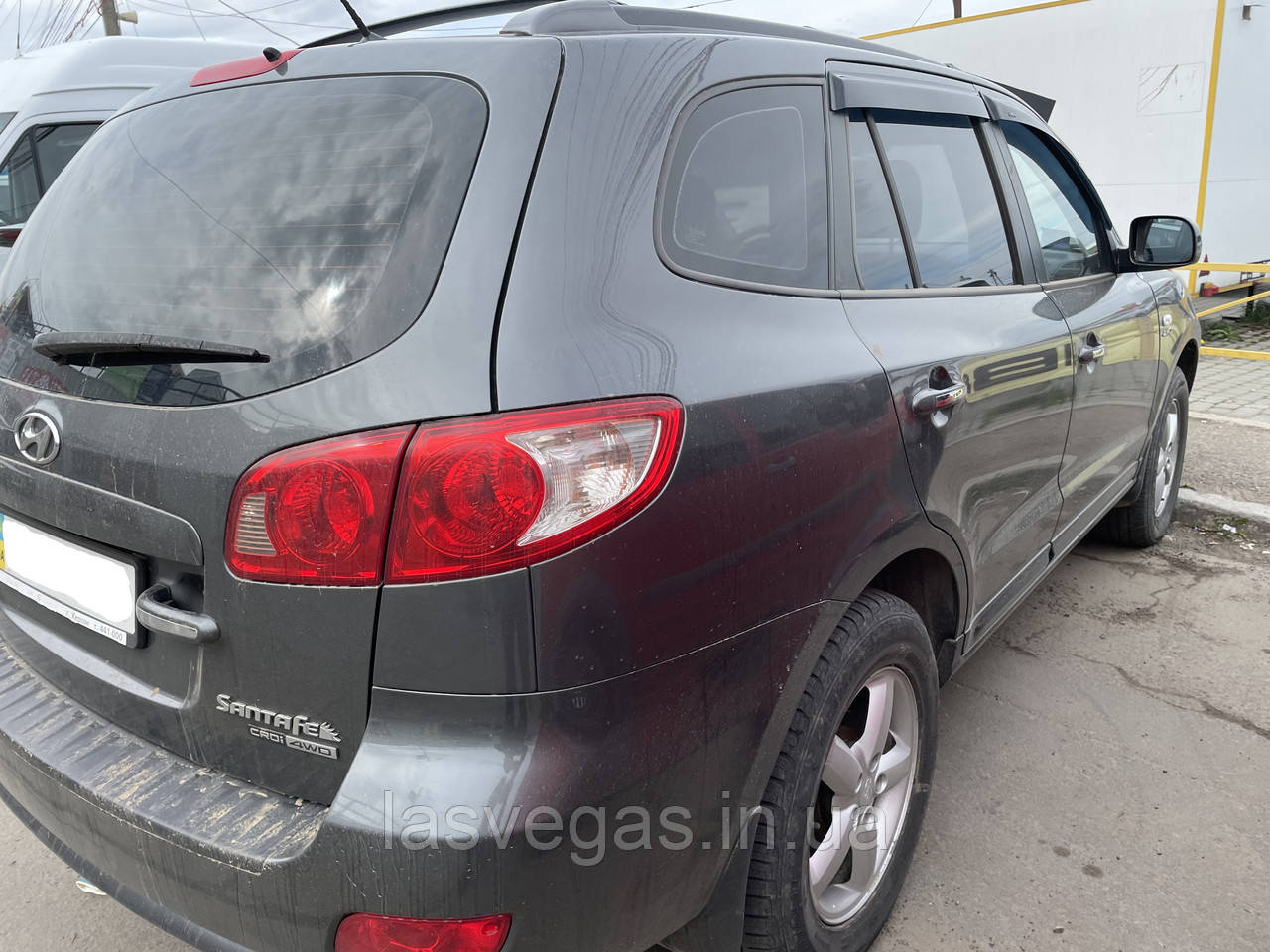 Дефлектори вікон (вітровики) Hyundai Santa Fe 2006-2011 (HIC/ Тайвань)