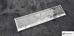 Рамка номерного знака з логотипом та написом "Mercedes-Benz"