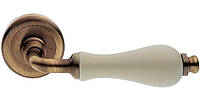 Ручка на розетці Manital VALENCIA OBR/CHA бронза сатин/фарфор шампань (Італія)