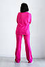 Костюм жіночий трикотаж рубчик штани кльош від коліна та подовжена кофта реглан колір малина, фото 6