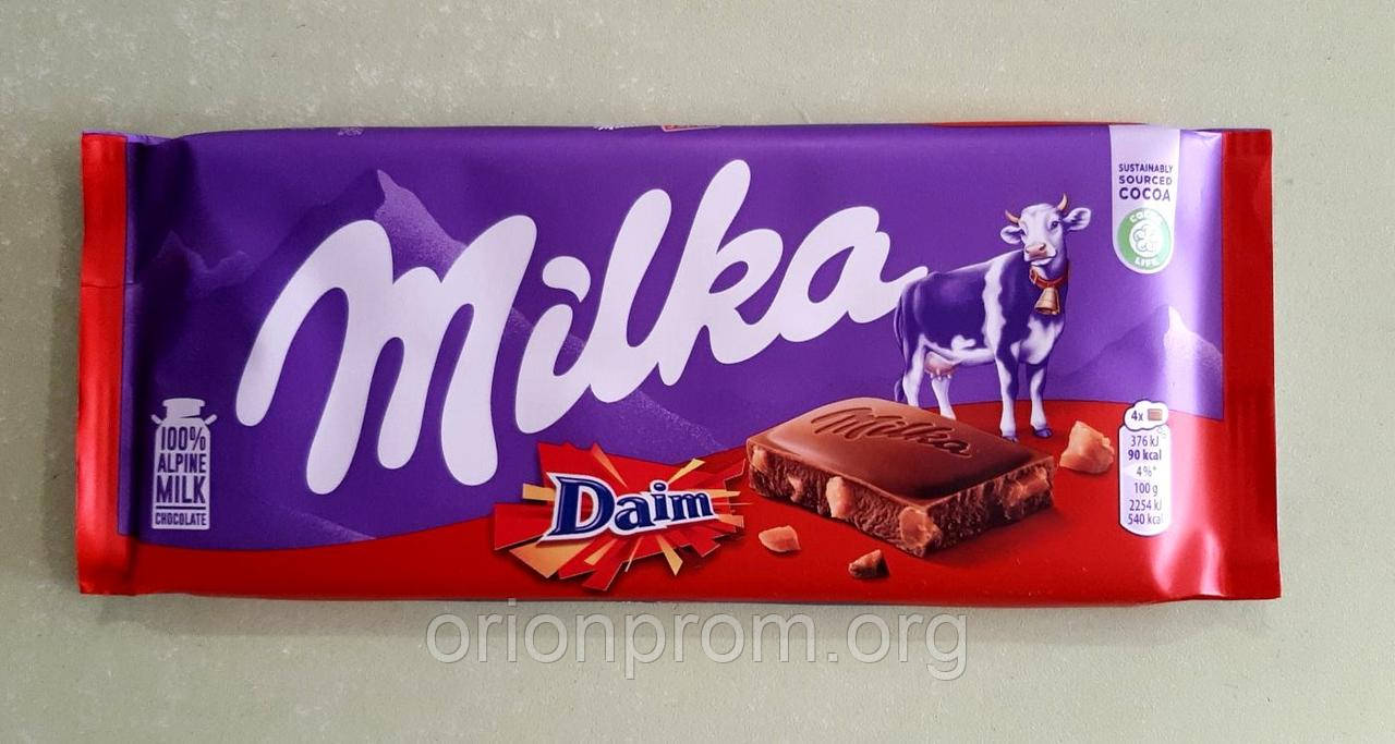 Шоколад Milka з мигдалем та карамеллю молочний 100 г