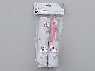Ролик-липучка для чищення одягу на 20 аркушів з двома змінними касетами, рожевого кольору.