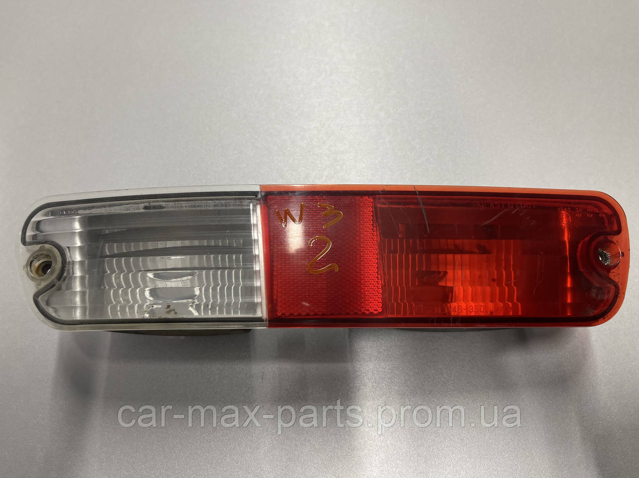 Ліхтар заднього бампера Лівий Mitsubishi Pajero Wagon III 2000-2007 СКЛАД НА ФОТО, фото 1