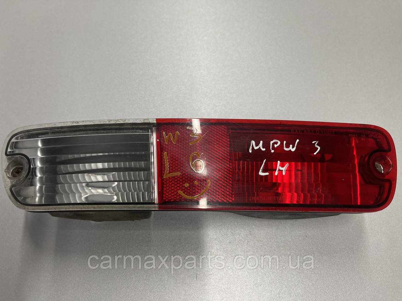 Ліхтар заднього бампера Лівий Mitsubishi Pajero Wagon III 2000-2007 СКЛАД НА ФОТО
