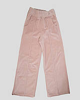 Велюрові штани для дівчинки з карманами та стрілками
