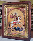 Ікона Святий Георгій Побідоносець в
темному фігурному кіоті під склом, розмір кіота53×43,розмір сюжета 30×40, фото 2