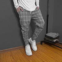 Зауженные мужские брюки в клетку