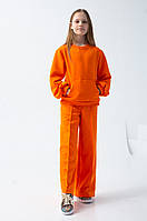 Спортивний костюм з широкими брюками зі стрілками для дівчинки помаранчевого кольору р. 104-170