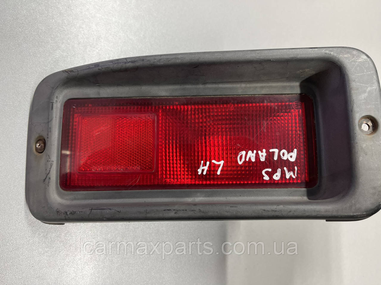 Ліхтар заднього бампера ЛОВИЙ Mitsubishi Pajero Sport 1 1997-2008