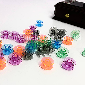 Шпулька пластикові для побутових машин 1/2 см Різнокольорові