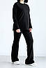Костюм  жіночий трикотаж рубчик штани кльош від коліна та подовжена кофта реглан-колір чорний, фото 3