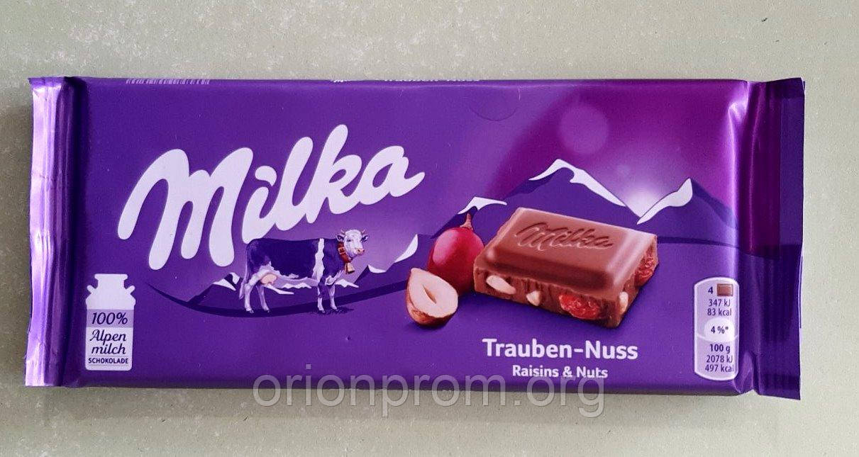 Шоколад Milka з фундуком та родзинками молочний 100 г