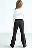 Кльош брюки для дівчинки трикотаж широкий рубчик з карманами чорного кольору (116-164), фото 3