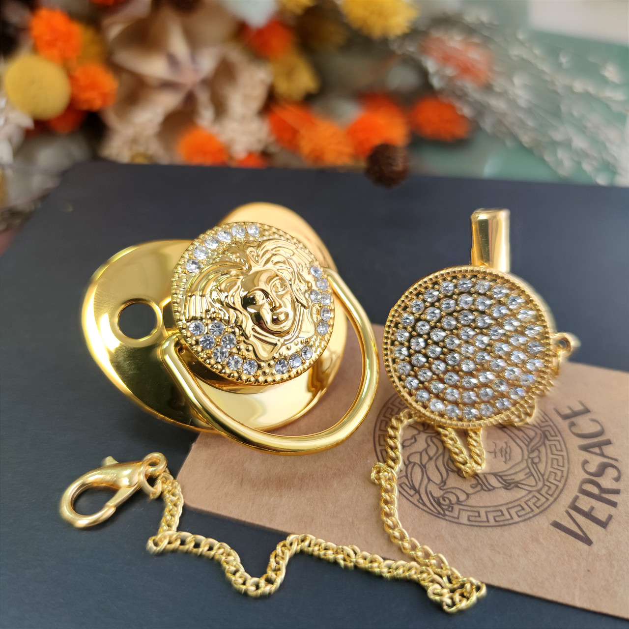 Versace pacifier sales