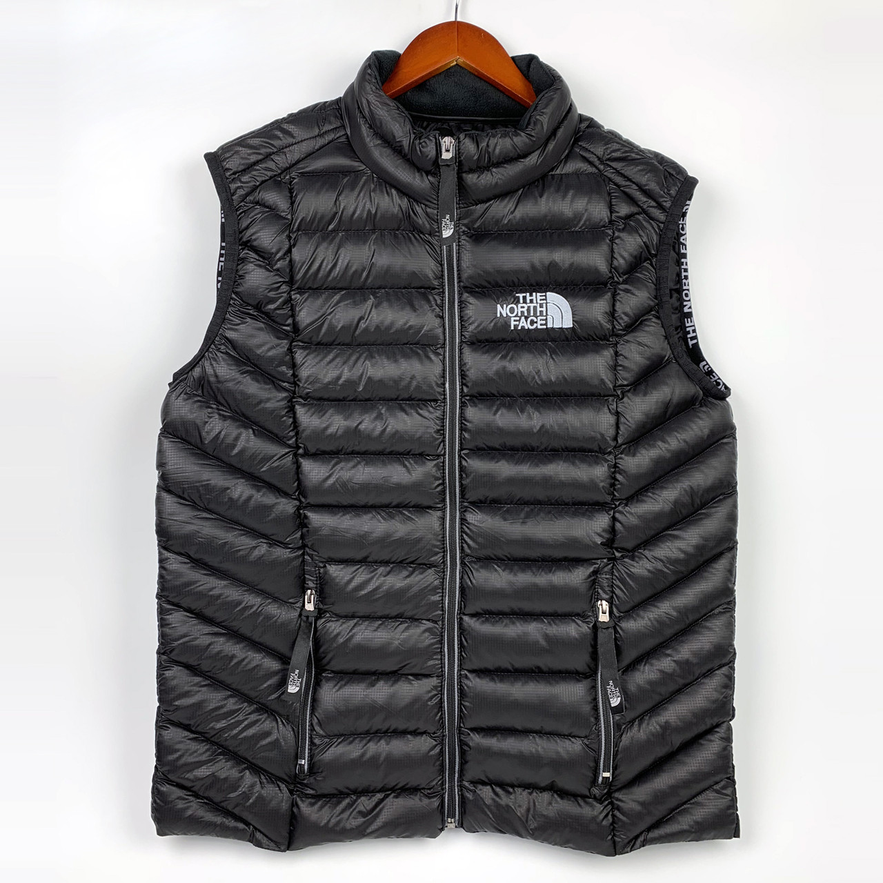 Чоловіча стьобана жилетка The North Face без капюшона, наповнювач синтепон, колір чорний