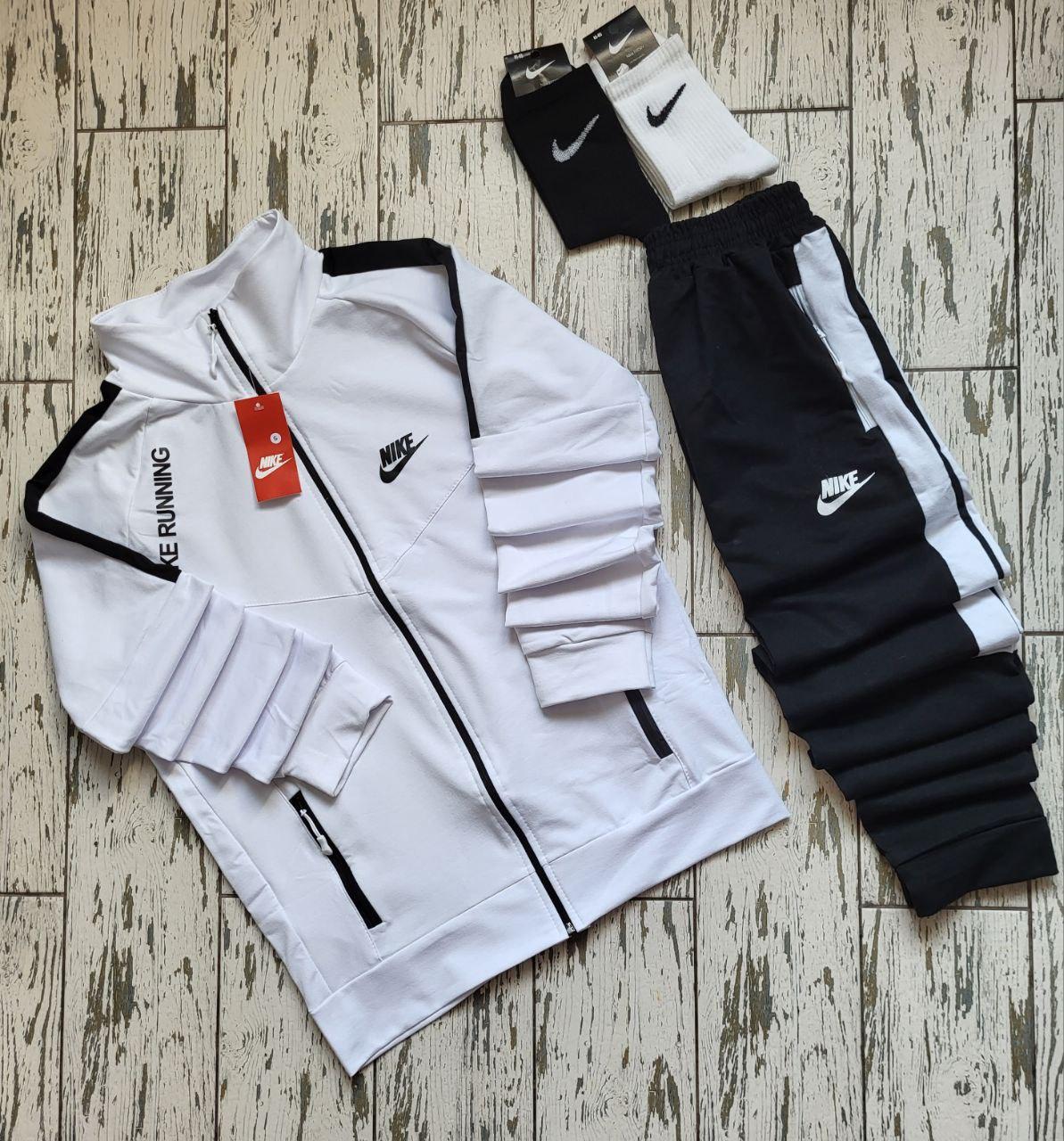 Pink and black nike tracksuit sales