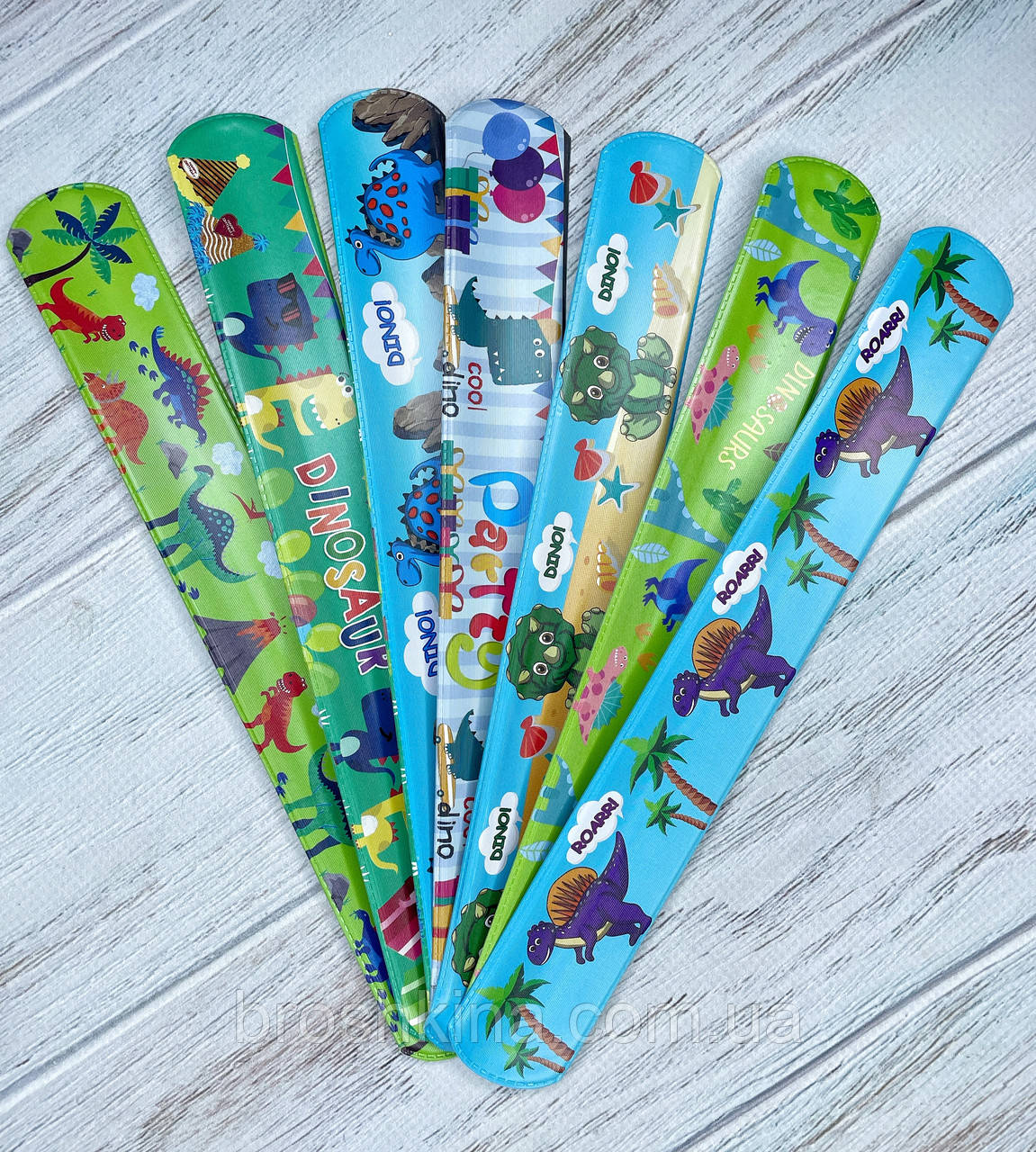 Дитячі браслетики/лінійка оптом 12 шт./пач. ДИНОЗАВРИ, фото 1