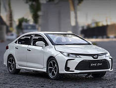 Модель автомобіля Toyota Corolla білого кольору 1:32 — інерційна машинка зі світлом і звуком, металевий корпус RESTEQ