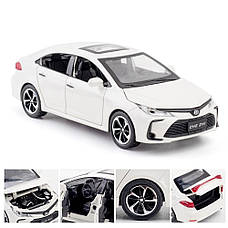 Модель автомобіля Toyota Corolla масштаб: 1:32. Іграшкова машинка Тойота Королла біла (звук, світло). Металева інерційна машинка, фото 3