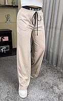 Женские расклешенные штаны в спортивнос стиле с резинкой на талии и разрезами снизу (р. 42-50) 44121026