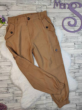 Жіночі штани Amisu коричневого кольору з манжетами та з кишенями Розмір  46 М