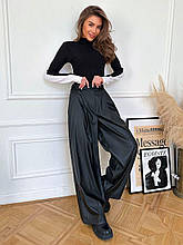 Трендові жіночі штани палаццо з еко-шкіри розміри норма та батал