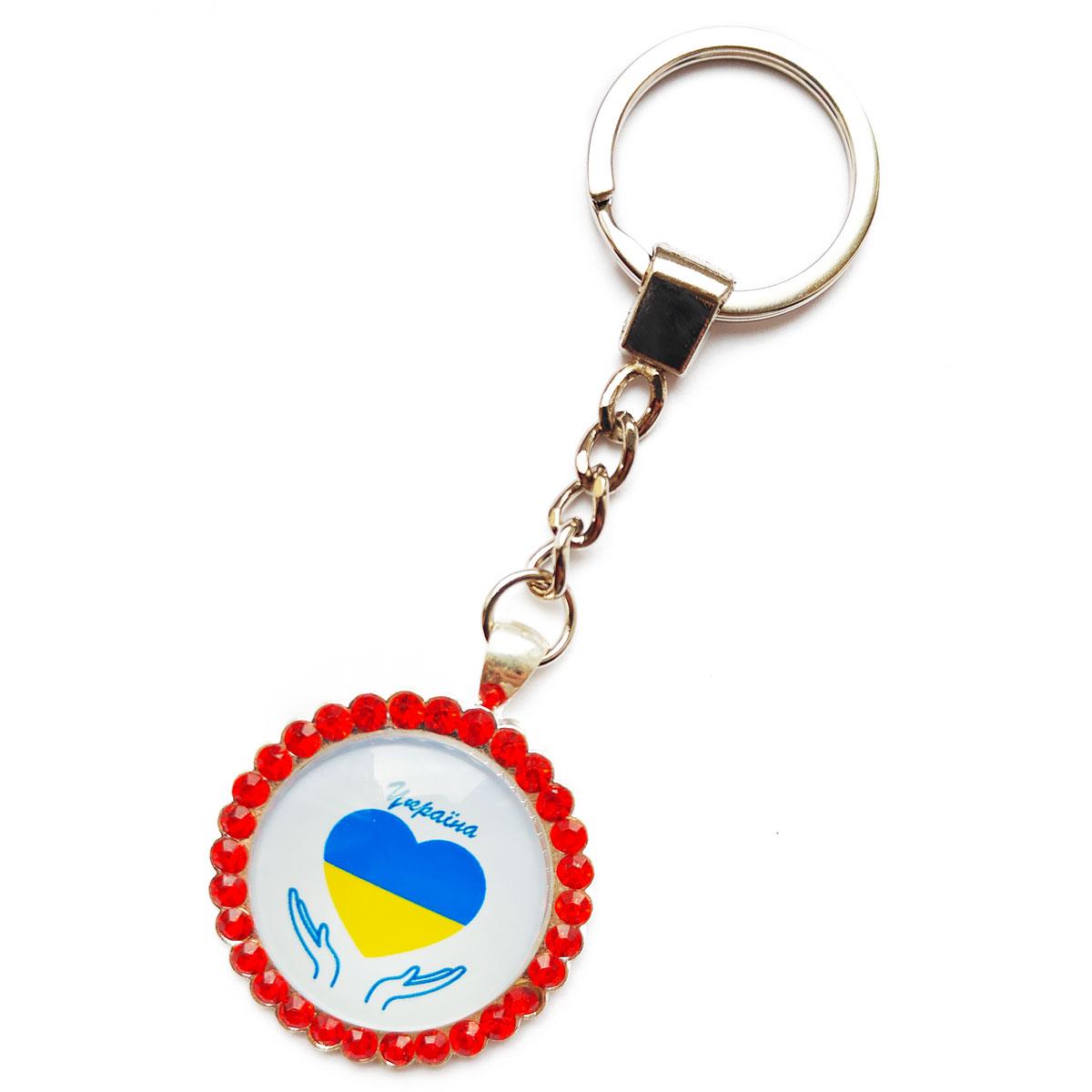 Брелок серце на долонях Україна з червоними камінцями