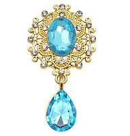 Камінь з підвісом в ажурній золотій оправі блакитна бірюза 2,6*4,6 см