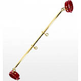 Розпорка БДСМ золотистого кольору з червоними манжетами для ніг Taboom Кайф, фото 3