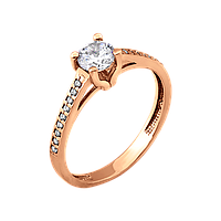 Золотое кольцо красивое с белым фианитом посередине и россыпью по бокам