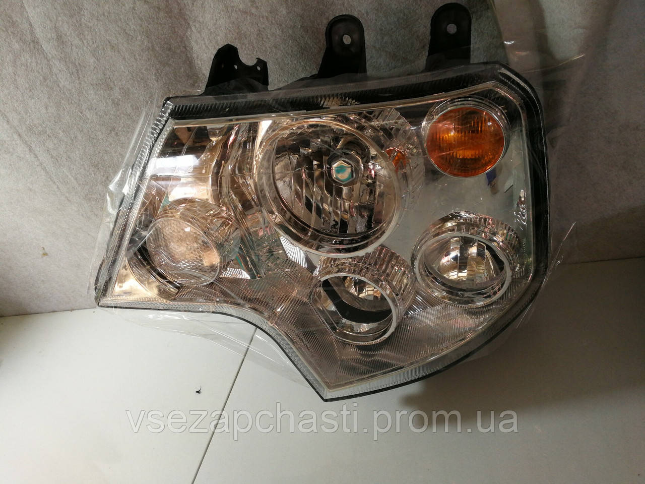 Фара права HOWO T5G WG9925721001