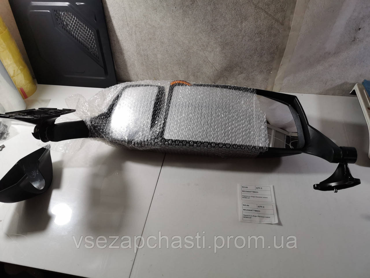 Дзеркало в зборі бокове ліве HOWO А7 WG1664778021