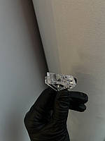 Затискач пластиковий прозорий