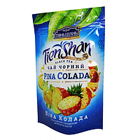 Чорний чай Тянь Шань Піна колада ананас з цедрою апельсина та пелюстками квітів 80 грам