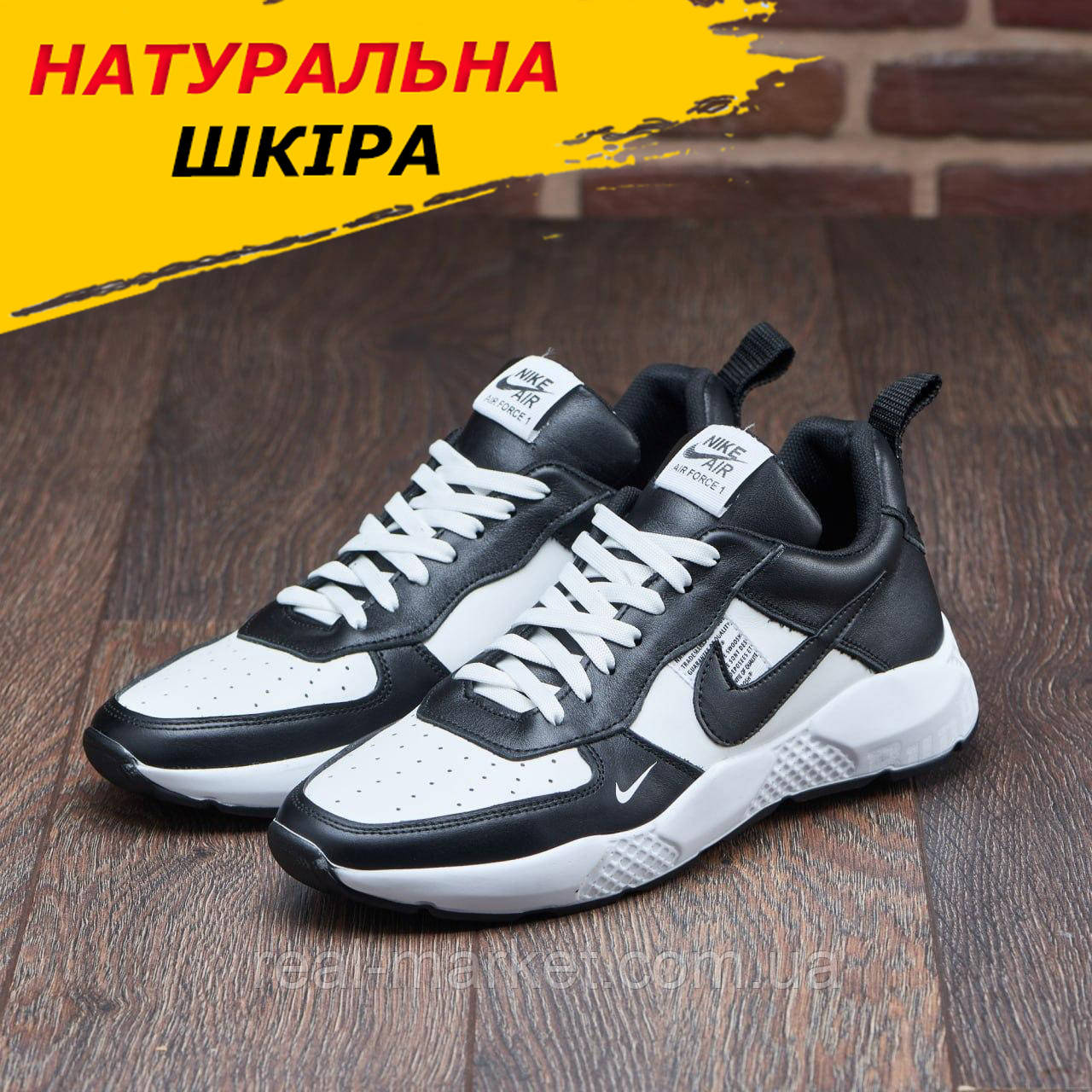 Весняні чоловічі шкіряні кросівки Nike (Найк) чорні з білим повсякденні з натуральної шкіри на весну взуття *015-ч/б*