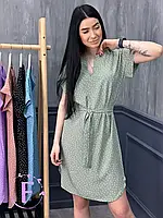 Платье светло зеленого цвета в горошек и коротким рукавом