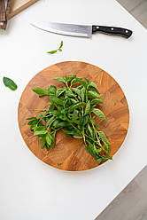 Кругла торцева обробна дошка діаметром 30 см з дуба та ясена