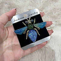 Оригінальний подарунок дівчині - яскрава велика брошка "Блакитний метелик з цирконами та вставками в сріблі"