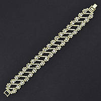 Браслет жіночий м'який металевий на руку золотистій доріжці квіточки до рядів довжина 18 см ширина 20 мм