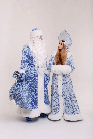 Комплект карнавальних костюмів Діда Мороза та Снігуроньки жаккард блакитний з білим