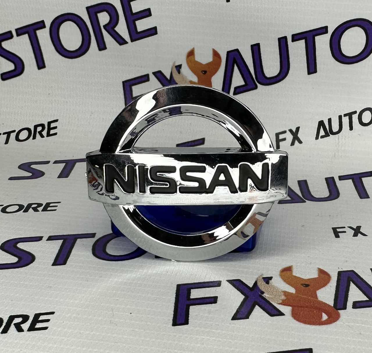 Емблема шильдик логотип NISSAN 88 х 75 мм (87х75) Хромована Ніссан