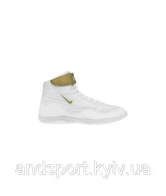white and gold nike inflicts