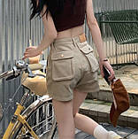 Джинсові шорти короткі з накладними кишенями жіночі, фото 3