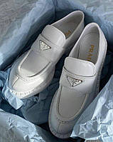 Белые женские лоферы Prada White Brushed Leather Loafers. Красивая женская обувь Прада.