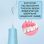 Портативний Іригатор Для Зубів Водонепроникний Professional 3 Режима Потужності + 2 Насадки 300 мл NiceFeel FC5091, фото 8