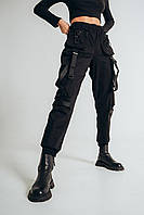 Черные широкие брюки карго с большими накладными карманами и манжетами внизу