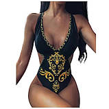 Чорний суцільний купальник з візерунком із золота, фото 4