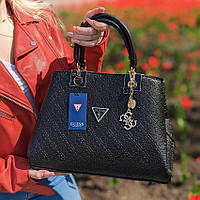 Ультрамодна чорна сумка саквояж з ручками, Жіноча популярна сумочка чорного кольору ремінець на плече