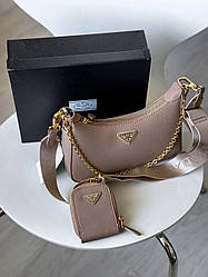 Жіноча сумка Прада бежева Prada Re-Edition Beige натуральна шкіра