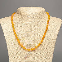 Намисто жовтогарячий "Бурштин" гладка кулька d-6мм+-, L-50см+- з каменю білий нефрит (сінт. фарб.) купити біжутерію дешево оптом в
